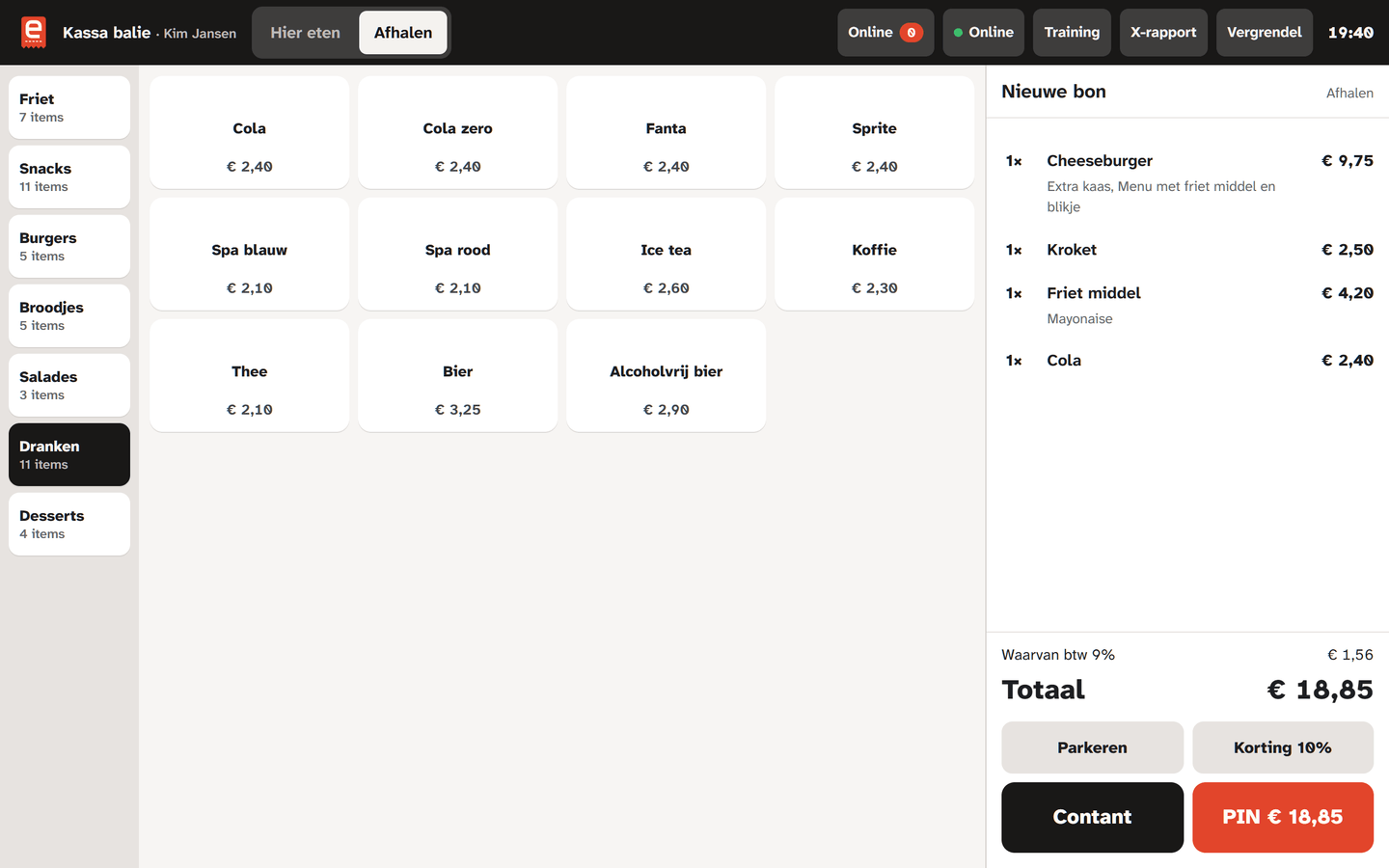 The register: categories on the left, drinks with their prices in the middle, and on the right a new four-line order with options on the cheeseburger and the fries, the total and the buttons to park the order, take cash or take a card payment.